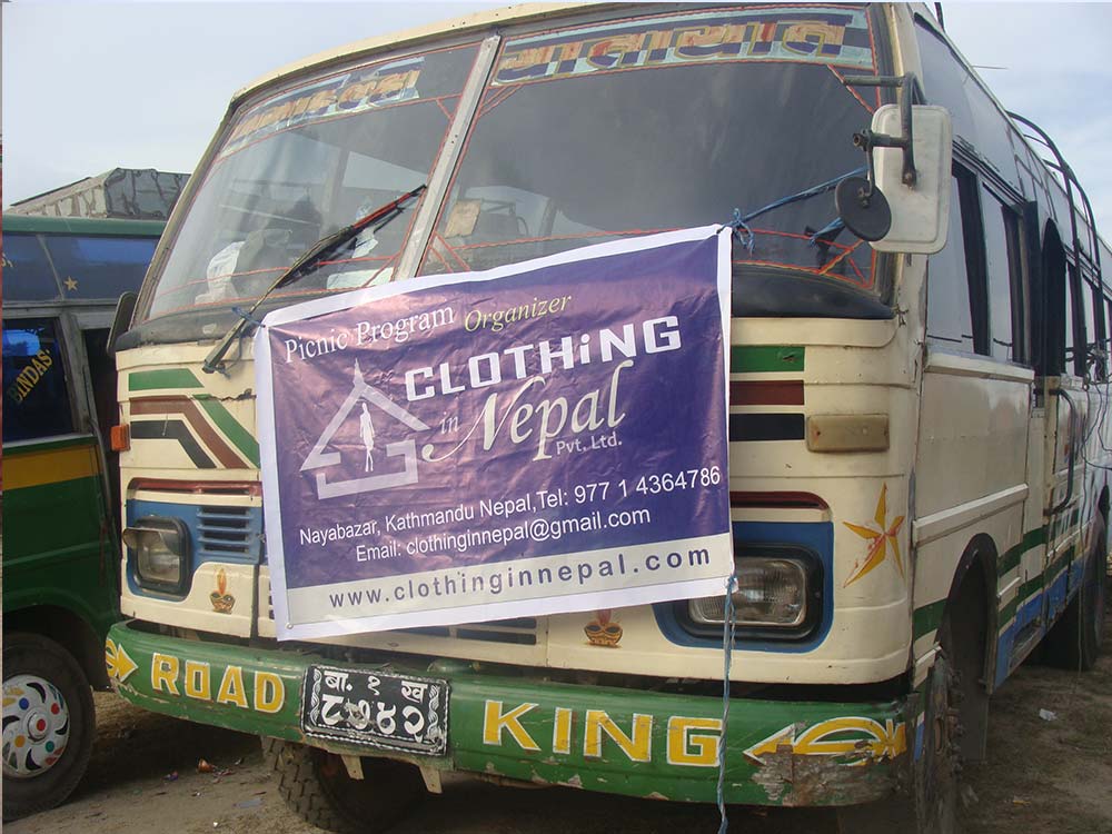 Tour bus with Company banner